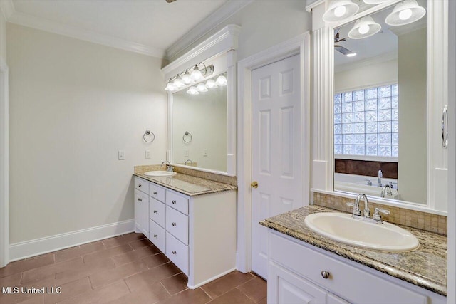 bathroom featuring vanity, crown molding, baseboards, and backsplash