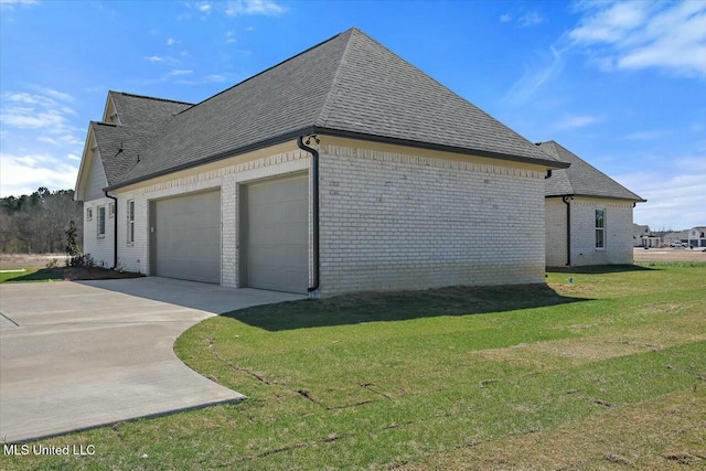 view of home's exterior featuring brick siding, an attached garage, and a shingled roof