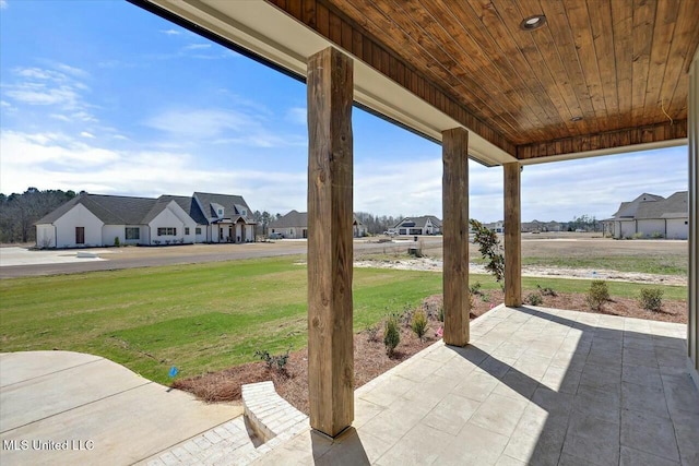 view of patio with a residential view