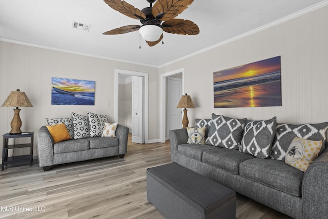114 Olson Ave, Long Beach, MS 39560 - living area featuring wood finished floors, crown molding, a ceiling fan, and baseboards