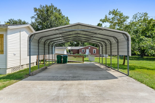 view of vehicle parking with a yard and a carport