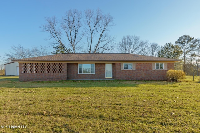 single story home with brick siding and a front lawn