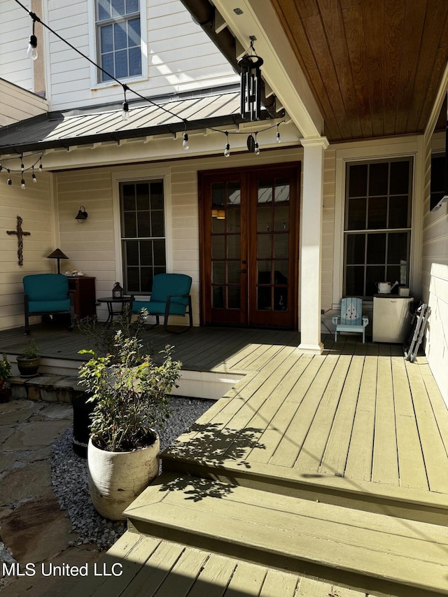 wooden terrace with french doors