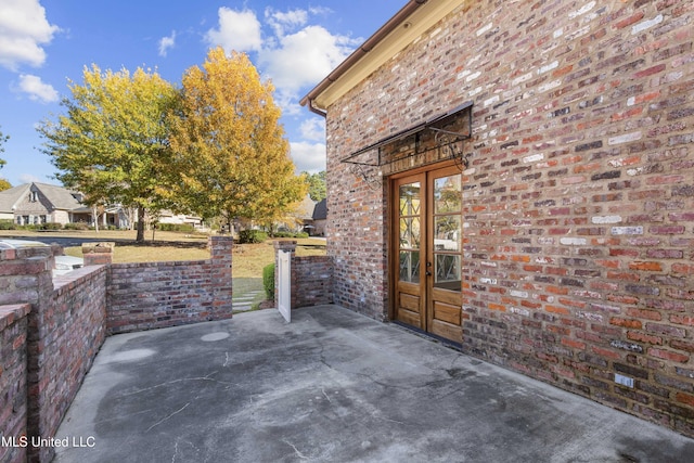 view of patio featuring french doors