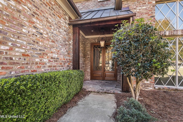 property entrance featuring french doors