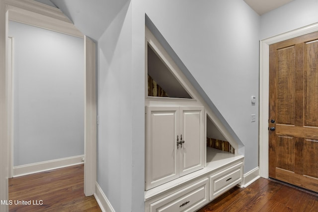 interior space with dark wood-type flooring