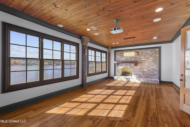 unfurnished sunroom with a water view, wood ceiling, and a fireplace