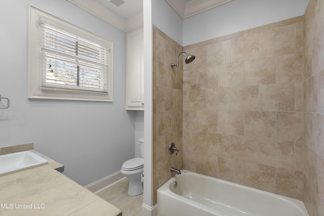 full bathroom featuring tile patterned floors, vanity, toilet, and tiled shower / bath