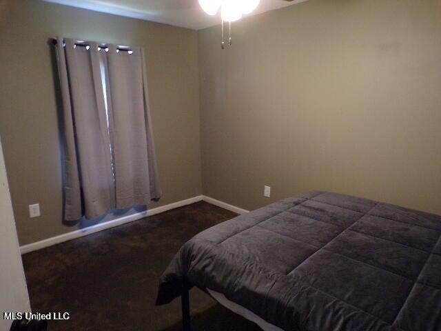 bedroom with baseboards