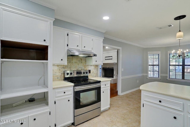 kitchen with crown molding, stainless steel range with electric stovetop, decorative light fixtures, and white cabinets