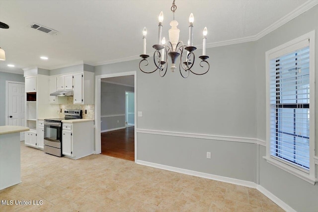 kitchen with stainless steel electric stove, decorative light fixtures, a chandelier, and white cabinets