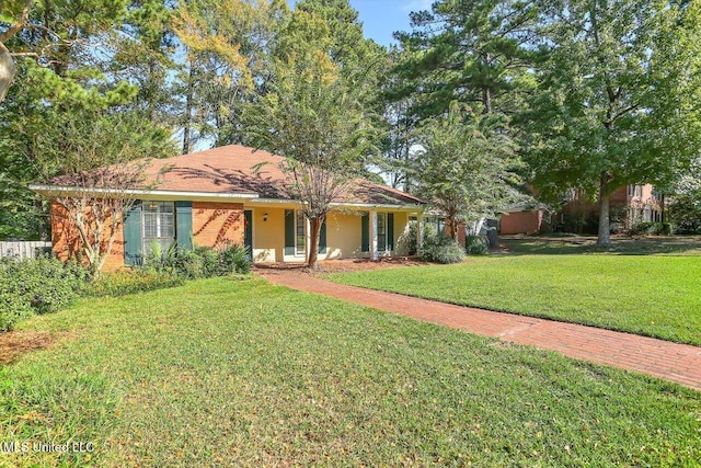 ranch-style house with a front lawn