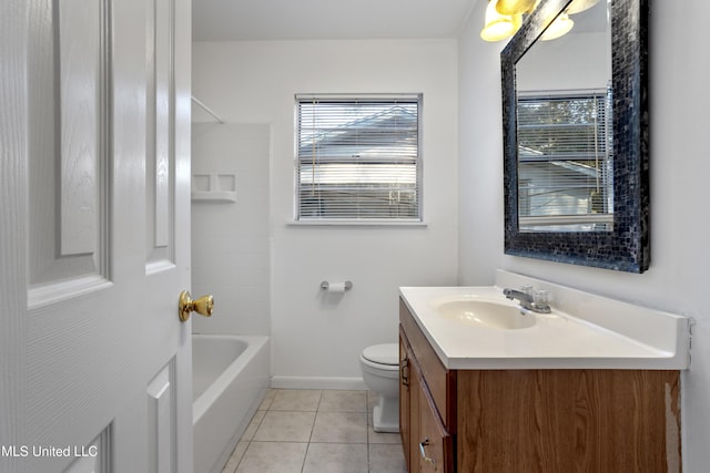 full bathroom featuring vanity, plenty of natural light, tile patterned floors, and toilet