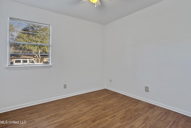 unfurnished room featuring ceiling fan and wood-type flooring