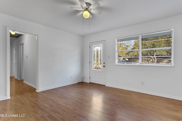 entrance foyer featuring hardwood / wood-style floors and ceiling fan