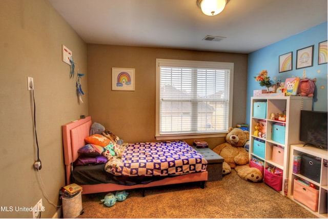 bedroom featuring carpet and visible vents