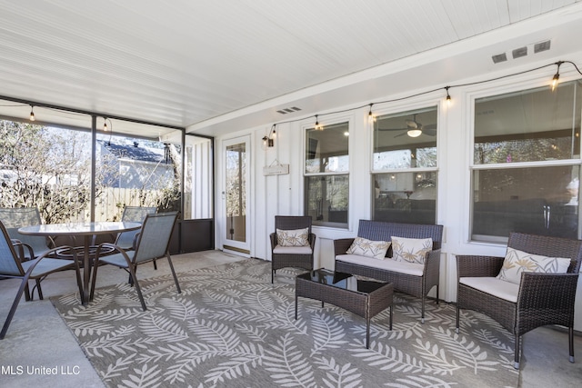 sunroom / solarium with visible vents and plenty of natural light