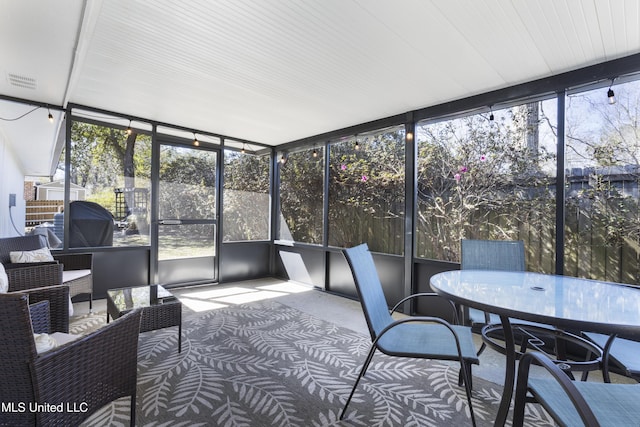 sunroom featuring visible vents