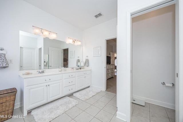 bathroom featuring vanity and tile patterned flooring