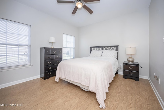 bedroom featuring ceiling fan and light hardwood / wood-style flooring