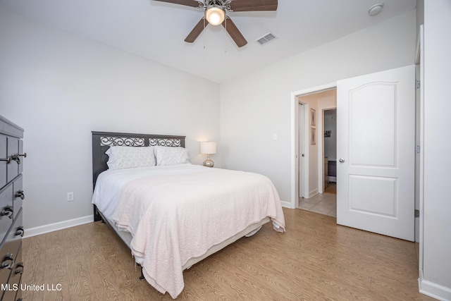 bedroom featuring ceiling fan and hardwood / wood-style floors