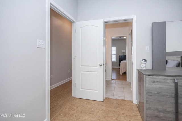 bathroom with wood-type flooring