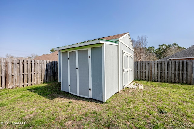 view of outdoor structure featuring a yard