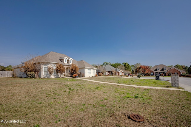 view of front facade with a front lawn