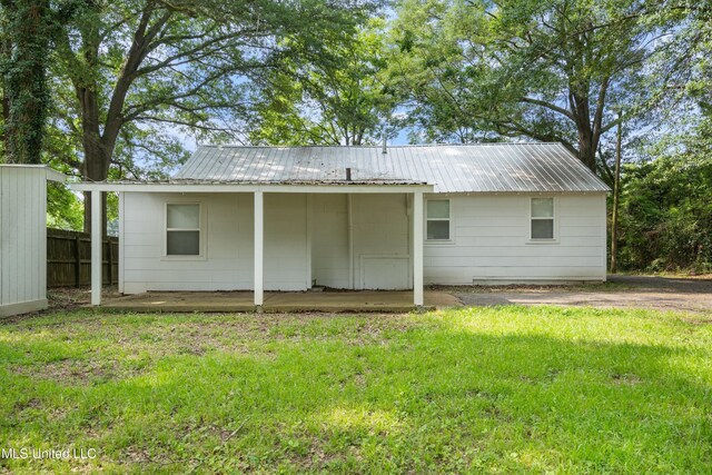 777 W Main St, Senatobia, MS 38668 - back of house with a metal roof