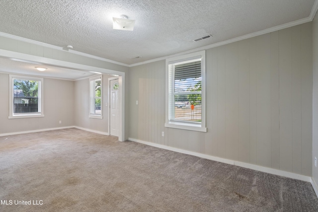 777 W Main St, Senatobia, MS 38668 - carpeted empty room with crown molding and a textured ceiling