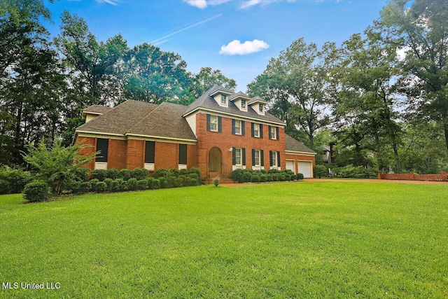 119 Easthaven Dr, Brandon, MS 39042 - view of front facade with a garage, brick siding, and a front lawn