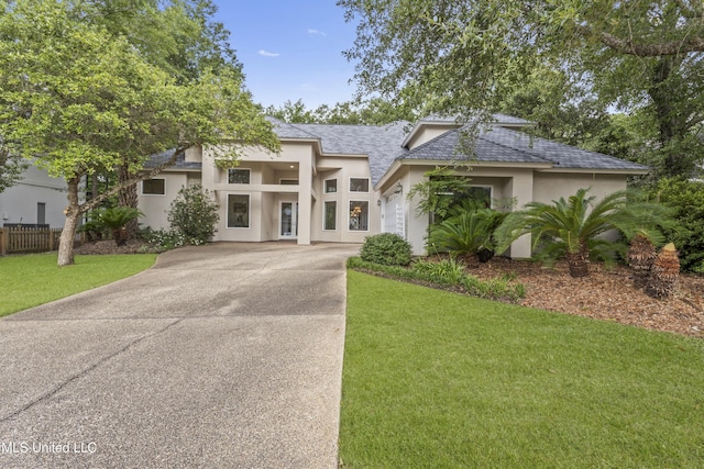 7395 Live Oak Way, Pass Christian, MS 39571 - view of front of home with stucco siding and driveway