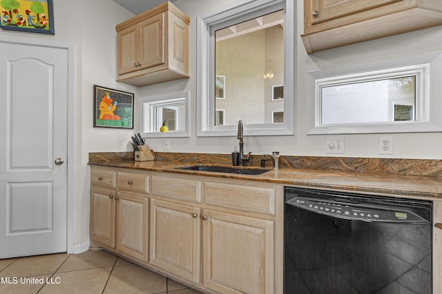 7395 Live Oak Way, Pass Christian, MS 39571 - kitchen featuring black dishwasher, a sink, light brown cabinetry, and light tile patterned floors