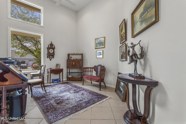 7395 Live Oak Way, Pass Christian, MS 39571 - office space with a towering ceiling, light tile patterned floors, ceiling fan, and baseboards