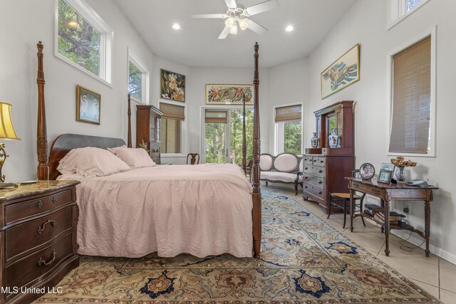7395 Live Oak Way, Pass Christian, MS 39571 - bedroom featuring multiple windows, recessed lighting, light tile patterned flooring, ceiling fan, and baseboards