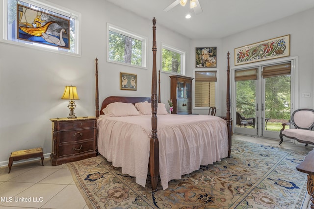 7395 Live Oak Way, Pass Christian, MS 39571 - bedroom featuring access to outside, light tile patterned floors, french doors, multiple windows, and recessed lighting