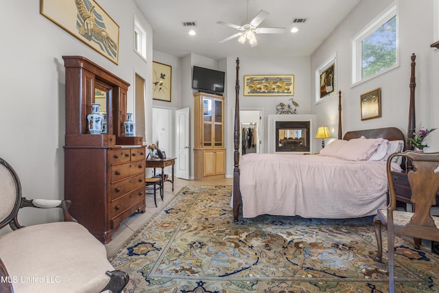 7395 Live Oak Way, Pass Christian, MS 39571 - bedroom featuring light tile patterned flooring and ceiling fan