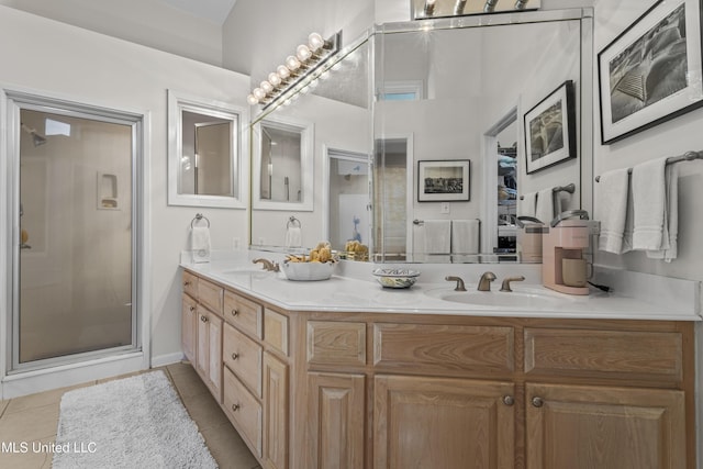 7395 Live Oak Way, Pass Christian, MS 39571 - bathroom with tile patterned floors, a stall shower, and double vanity