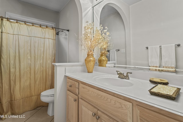 7395 Live Oak Way, Pass Christian, MS 39571 - full bath with toilet, tile patterned floors, vanity, and curtained shower