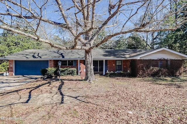 single story home with a garage