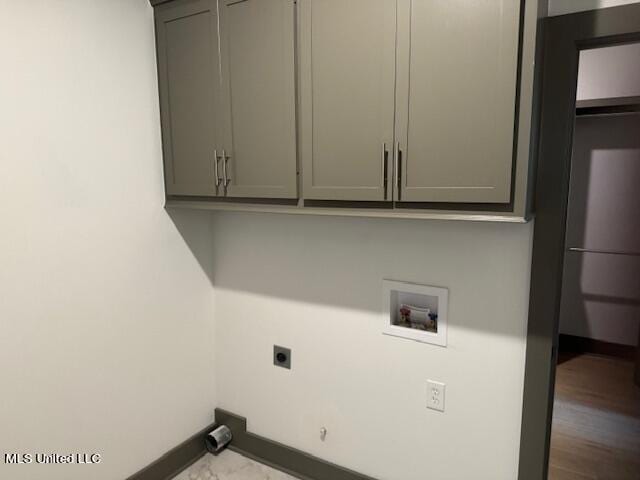 317 Willow Way Unit 158, Canton, MS 39046 - laundry room featuring electric dryer hookup, baseboards, cabinet space, and washer hookup