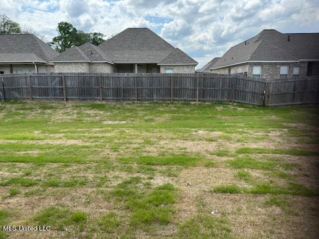 317 Willow Way Unit 158, Canton, MS 39046 - view of yard featuring fence