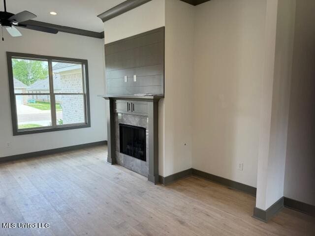 317 Willow Way Unit 158, Canton, MS 39046 - unfurnished living room with recessed lighting, a fireplace, light wood finished floors, baseboards, and a ceiling fan