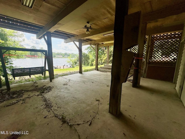 577 W Lakeshore Dr, Carriere, MS 39426 - view of patio / terrace featuring a water view and ceiling fan