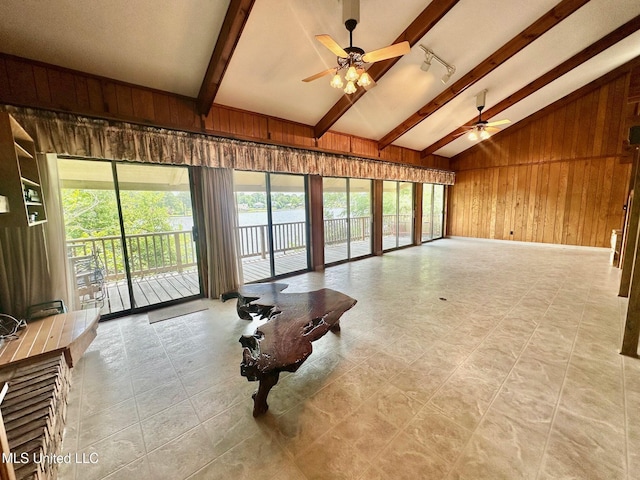 577 W Lakeshore Dr, Carriere, MS 39426 - living area featuring wood walls and ceiling fan