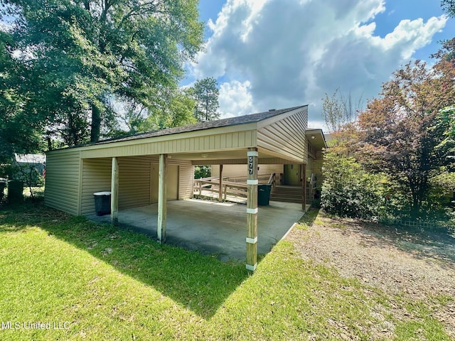 577 W Lakeshore Dr, Carriere, MS 39426 - view of car parking featuring a carport and driveway