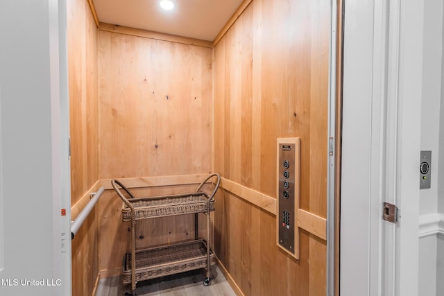 5004 Oak St, Bay Saint Louis, MS 39520 - elevator with wooden walls