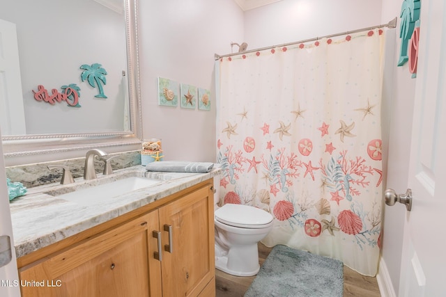 5004 Oak St, Bay Saint Louis, MS 39520 - bathroom with vanity, wood finished floors, and curtained shower