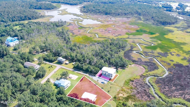 5004 Oak St, Bay Saint Louis, MS 39520 - aerial overview of property's location featuring a large body of water and property boundaries highlighted
