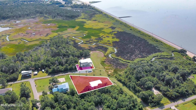 5004 Oak St, Bay Saint Louis, MS 39520 - aerial view of property and surrounding area featuring a large body of water and property parcel outlined